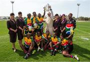 6 March 2015; Etihadstaff, from left, Danielle Lyall, Joanne Walsh, Rachel Brennan and Rebekah Gatson, along with Michéal O Muircheartaigh and the South Africa team with the Liam MacCarthy Cup. Zayed Sports Stadium, Abu Dhabi, United Arab Emirates. Picture credit: Ray McManus / SPORTSFILE
