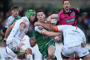 1 March 2015; John Cooney, Connacht, is tackled by Matteo Zanusso, Benetton Treviso. Guinness PRO12 Round 16, Connacht v Benetton Treviso, Sportsground, Galway. Picture credit: Ramsey Cardy / SPORTSFILE