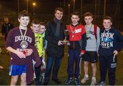 6 March 2015; Republic of Ireland assistant manager Roy Keane presents the Late Night Leagues finals trophy to Knocknaheeny team captain Adam Crowley. Late Night Leagues is a youth diversion programme, run in conjunction with the Gardaí, Foróige and the FAI, and sponsored by IPB, to utilise football as a tool for social inclusion.  Sam Allen Pitches, Leisure World, Churchfield, Cork City. Picture credit: Matt Browne / SPORTSFILE