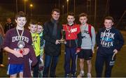 6 March 2015; Republic of Ireland assistant manager Roy Keane presentsl the Late Night Leagues finals trophy to Knocknaheeny team captain Adam Crowley. Late Night Leagues is a youth diversion programme, run in conjunction with the Gardaí, Foróige and the FAI, and sponsored by IPB, to utilise football as a tool for social inclusion.  Sam Allen Pitches, Leisure World, Churchfield, Cork City. Picture credit: Matt Browne / SPORTSFILE