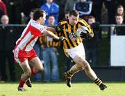 27 January 2008; Oisin McConville, Crossmaglen Rangers,  in action against Hughie Cunningham, Tir Chonaill Gaels. AIB All-Ireland Club Football Championship Quarter-Final, Tir Chonaill Gaels v Crossmaglen Rangers, Emerald Gaelic Grounds, Ruislip, London, England. Picture credit: Oliver McVeigh / SPORTSFILE