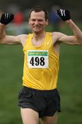 10 February 2008; Dave Morwood, North Belfast Harriers A.C, crosses the line to win the Masters Men 7,000m race. The Woodie's DIY National Intermediate and Masters Cross Country Championships. St Martin's GAA Club, Piercestown, Wexford. Picture credit; Tomas Greally / SPORTSFILE