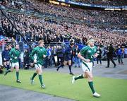 9 February 2008; Ireland's Jamie Heaslip makes his way onto the pitch for the start of the game with team-mates Andrew Trimble and Geordan Murphy. RBS Six Nations Rugby Championship, France v Ireland, Stade De France, Paris, France. Picture credit; Matt Browne / SPORTSFILE