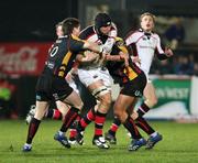 15 February 2008; Stephen Ferris, Ulster, is tackled by Ceri Sweeney and Ashley Smith, Dragons. Magners League, Ulster v Dragons, Ravenhill Park, Belfast, Co. Antrim. Picture credit; Oliver McVeigh / SPORTSFILE