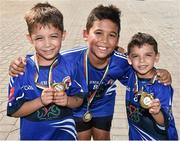 7 March 2015; Oisín Lawlor, left, six years, with his two brothers Calum, 9, and Aidan 5, who won medals as members of the Arabian Celts team, from Bahrain, during the under age tournament at the GAA World Games. Zayed Sports Stadium, Abu Dhabi, United Arab Emirates. Picture credit: Ray McManus / SPORTSFILE