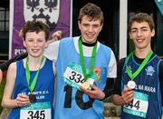 7 March 2015; On the podium after the Minor Boy's race are, first placed Louis O'Loughlin, Moyle Park, second placed Jake Bagge, Ardscoil na Mara Tramore, right, and third placed Finn Looney, St Annes Killaloe, at the GloHealth All Ireland Schools Cross Country Championships. Clongowes Wood College, Co. Kildare. Picture credit: Ramsey Cardy / SPORTSFILE