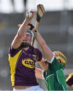 8 March 2015; Ian Byrne, Wexford, in action against Paul Browne, Limerick. Allianz Hurling League, Division 1A, Round 3, Wexford v Limerick, Wexford Park, Wexford. Picture credit: David Maher / SPORTSFILE