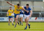 8 March 2015; Ian Kilbride, Roscommon, in action against John O'Loughlin, Laois. Allianz Football League, Division 2, Round 4, Laois v Roscommon. O'Moore Park, Portlaoise, Co. Laois. Picture credit: Piaras Ó Mídheach / SPORTSFILE