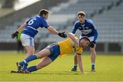 8 March 2015; Donie Shine, Roscommon, in action against Robbie Kehoe, Laois, supported by team-mate Conor Boyle, right. Allianz Football League, Division 2, Round 4, Laois v Roscommon. O'Moore Park, Portlaoise, Co. Laois. Picture credit: Piaras Ó Mídheach / SPORTSFILE