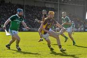 8 March 2015; Podge Doran, Wexford, in action against Richie McCarthy, Limerick. Allianz Hurling League, Division 1A, Round 3, Wexford v Limerick, Wexford Park, Wexford. Picture credit: David Maher / SPORTSFILE