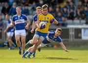 8 March 2015; Enda Smith, Roscommon, in action against Colm Begley, bottom, and Gearoid Hanrahan, Laois. Allianz Football League, Division 2, Round 4, Laois v Roscommon. O'Moore Park, Portlaoise, Co. Laois. Picture credit: Piaras Ó Mídheach / SPORTSFILE