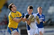 8 March 2015; Graham Brody, Laois, in action against Mark Nally, Roscommon. Allianz Football League, Division 2, Round 4, Laois v Roscommon. O'Moore Park, Portlaoise, Co. Laois. Picture credit: Piaras Ó Mídheach / SPORTSFILE