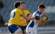 8 March 2015; Graham Brody, Laois, in action against Mark Nally, left, and Diarmuid Murtagh, Roscommon. Allianz Football League, Division 2, Round 4, Laois v Roscommon. O'Moore Park, Portlaoise, Co. Laois. Picture credit: Piaras Ó Mídheach / SPORTSFILE