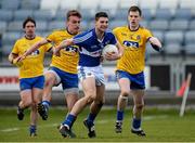 8 March 2015; Brendan Quigley, Laois, in action against Enda Smith and Niall Carty, right, Roscommon. Allianz Football League, Division 2, Round 4, Laois v Roscommon. O'Moore Park, Portlaoise, Co. Laois. Picture credit: Piaras Ó Mídheach / SPORTSFILE