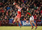 8 March 2015; Dermot McBride, Derry, in action against Cillian O'Connor, Mayo. Allianz Football League, Division 1, Round 4, Derry v Mayo, Celtic Park, Derry. Photo by Sportsfile