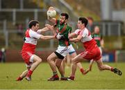 8 March 2015; Kevin McLoughlin, Mayo, in action against Benny Heron, left, and Kevin Johnston, Derry. Allianz Football League, Division 1, Round 4, Derry v Mayo, Celtic Park, Derry. Photo by Sportsfile