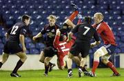 15 February 2008; Munster's Doug Howlett is spear tackled by Roland Reid, Edinburgh Rugby, who was subsequently sin binned. Magners League, Edinburgh Rugby v Munster, Murrayfield, Edinburgh, Scotland. Picture credit; Dave Gibson / SPORTSFILE