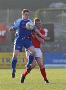 16 February 2008; Jamie Tomelty, Dungannon Swifts, in action against David McAlinden, Cliftonville. Carnegie League Premier Division, Dungannon Swifts v Cliftonville, Stangmore Park, Dungannon, Co. Tyrone. Picture credit; Oliver McVeigh / SPORTSFILE
