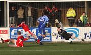 16 February 2008; Michael Hegarty, Dungannon Swifts, 25, scores the first goal against John Connelly, Cliftonville. Carnegie League Premier Division, Dungannon Swifts v Cliftonville, Stangmore Park, Dungannon, Co. Tyrone. Picture credit; Oliver McVeigh / SPORTSFILE