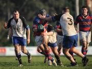 16 February 2008; Martin Garvey, Clontarf, is tackled by Cork Constitution's Timmy Ryan, right, and Daragh Hurley. AIB League Division 1, Clontarf v Cork Constitution, Castle Avenue, Clontarf, Dublin. Picture credit; Caroline Quinn / SPORTSFILE