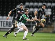 16 February 2008; Connacht's Andrew Dunne moves the ball out wide. Magners League, Ospreys v Connacht, Liberty Stadium, Swansea, Wales. Picture credit; Steve Pope / SPORTSFILE