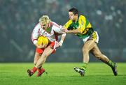 16 February 2008; Owen Mulligan, Tyrone, in action against Aidan O'Mahony, Kerry. Allianz National Football League, Division 1, Round 2, Kerry v Tyrone, Austin Stack Park, Tralee, Co. Kerry. Picture credit; Brendan Moran / SPORTSFILE