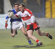 16 February 2008; Paddy Bradley, Derry, in action against Cathal Ryan, Laois. Allianz National Football League, Division 1, Round 2, Laois v Derry, O'Moore Park, Portlaoise, Co. Laois. Picture credit; Pat Murphy / SPORTSFILE *** Local Caption ***