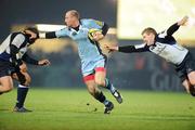 16 February 2008; Gareth Thomas, Cardiff Blues, is tackled by Ollie Le Roux, left, and Michael Berne, Leinster. Magners League, Leinster v Cardiff Blues, RDS, Ballsbridge, Dublin. Picture credit; Stephen McCarthy / SPORTSFILE