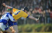 17 February 2008; Niall Gilligan, Clare, is tackled by John A. Delaney, Laois, for which he received a 'yellow card'.  Allianz National Hurling League, Division 1B, Round 2, Clare v Laois, Scarriff GAA Park, Scarriff, Co. Clare. Picture credit; Ray McManus / SPORTSFILE