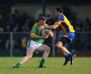 17 February 2008; Nigel Crawford, Meath, in action against Mark O'Carroll, Roscommon. Allianz National Football League, Division 2, Round 2, Roscommon v Meath, Kiltoom, Co. Roscommon. Picture credit; Brian Lawless / SPORTSFILE
