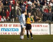 17 February 2008; Referee Michael Hughes issues a red card to Gary White, Kildare. Allianz National Football League, Division 1, Round 2, Kildare v Galway, St Conleth's Park, Newbridge, Co. Kildare. Picture credit; Gavin McDowell / SPORTSFILE