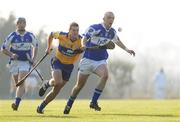 17 February 2008; Dermot McGill, Laois, races clear of Clare's Brian O'Connell. Allianz National Hurling League, Division 1B, Round 2, Clare v Laois, Scarriff GAA Park, Scarriff, Co. Clare. Picture credit; Ray McManus / SPORTSFILE