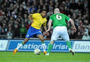 6 February 2008; Robinho, Brazil, in action against Lee Carsley, Republic of Ireland. International Friendly, Republic of Ireland v Brazil, Croke Park, Dublin. Picture credit; Pat Murphy / SPORTSFILE *** Local Caption ***