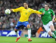 6 February 2008; Luis Fabiano, Brazil, in action against Richard Dunne, Republic of Ireland. International Friendly, Republic of Ireland v Brazil, Croke Park, Dublin. Picture credit; Pat Murphy / SPORTSFILE *** Local Caption ***