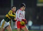 16 February 2008; Raymond Mulgrew, Tyrone, in action against Tomas O Se, Kerry. Allianz National Football League, Division 1, Round 2, Kerry v Tyrone, Austin Stack Park, Tralee, Co. Kerry. Picture credit; Brendan Moran / SPORTSFILE