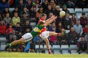 8 March 2015; Donncha O'Connor, Cork, kicks a point despite the best efforts of Peter Crowley, Kerry. Allianz Football League, Division 1, Round 4, Cork v Kerry, Páirc Uí Rinn, Cork. Picture credit: Brendan Moran / SPORTSFILE
