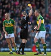 8 March 2015; Referee Anthony Nolan shows a yellow card to each of Barry John Keane, left, and Kieran Donaghy. Allianz Football League, Division 1, Round 4, Cork v Kerry, Páirc Uí Rinn, Cork. Picture credit: Brendan Moran / SPORTSFILE