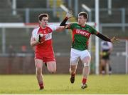 8 March 2015; Dermot McBride, Derry, in action against Cillian O'Connor, Mayo. Allianz Football League, Division 1, Round 4, Derry v Mayo, Celtic Park, Derry. Photo by Sportsfile