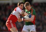 8 March 2015; Kevin Keane, Mayo, in action against , Michael McIver, Derry. Allianz Football League, Division 1, Round 4, Derry v Mayo, Celtic Park, Derry. Photo by Sportsfile