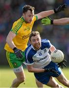 8 March 2015; Owen Duffy, Monaghan, in action against Martin McElhinney, Donegal. Allianz Football League, Division 1, Round 4, Donegal v Monaghan, O’Donnell Park, Letterkenny, Co. Donegal. Picture credit: Oliver McVeigh / SPORTSFILE