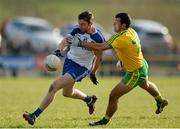 8 March 2015; Owen Duffy, Monaghan, in action against Frank McGlynn, Donegal. Allianz Football League, Division 1, Round 4, Donegal v Monaghan, O’Donnell Park, Letterkenny, Co. Donegal. Picture credit: Oliver McVeigh / SPORTSFILE