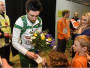 8 March 2015; Ireland's Mark English signs autographs for local children after his Men's 800m Final event, where he finished in second position with a time of 1:47.20. European Indoor Athletics Championships 2015, Day 4, Prague, Czech Republic. Picture credit: Pat Murphy / SPORTSFILE