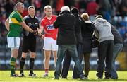 8 March 2015; Team captains Kieran Donaghy, left, Kerry, and Michael Shields, Cork, shake hands in the company of referee Anthony Nolan before the game. Allianz Football League, Division 1, Round 4, Cork v Kerry, Páirc Uí Rinn, Cork. Picture credit: Brendan Moran / SPORTSFILE