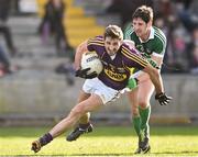 8 March 2015; Brian Malone, Wexford, in action against Padraig Browne, Limerick. Allianz Football League, Division 3, Round 4, Wexford v Limerick, Wexford Park, Wexford. Picture credit: David Maher / SPORTSFILE
