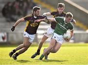 8 March 2015; Darragh Tracey, Limerick, in action against Brian Malone and Colm Kehoe, Wexford. Allianz Football League, Division 3, Round 4, Wexford v Limerick, Wexford Park, Wexford. Picture credit: David Maher / SPORTSFILE
