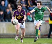 8 March 2015; Ben Brosnan, Wexford, in action against Robert Browne, Limerick. Allianz Football League, Division 3, Round 4, Wexford v Limerick, Wexford Park, Wexford. Picture credit: David Maher / SPORTSFILE