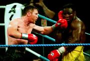 18 March 1995; Steve Collins lands a left on Chris Eubank's chin when Collins defeated Eubank to win the WBO World Super-Middleweight Title in Millstreet, Co. Cork, Ireland. Picture credit; David Maher / SPORTSFILE.