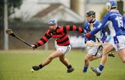 21 February 2008; Jason Carrol, Colaiste Eamann Ris, in action against John Kehoe and Naoise Maguire, right, Colaiste Eanna. Leinster Colleges Senior Hurling B Quarter-Final, Colaiste Eanna v Colaiste Eamann Ris, Ballyboden, Dublin. Picture credit; Caroline Quinn / SPORTSFILE