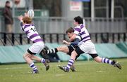 20 February 2008; Jack O'Driscoll, Cistercian College Roscrea, is tackled by Diarmuid Kennedy and Harry Burns, left, Clongowes Wood College. Leinster Schools Junior Cup Semi-Final, Cistercian College Roscrea v Clongowes Wood College, Donnybrook, Dublin. Picture credit; Stephen McCarthy / SPORTSFILE