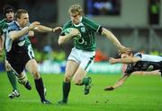 23 February 2008; Ireland's Andrew Trimble is tackled by Scotland's Andy Henderson and Mike Blair. RBS Six Nations Rugby Championship, Ireland v Scotland, Croke Park, Dublin. Picture credit; Brendan Moran / SPORTSFILE